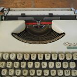 Typewriter Olympia 66, with cover