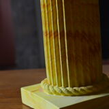 Lamp draped on column