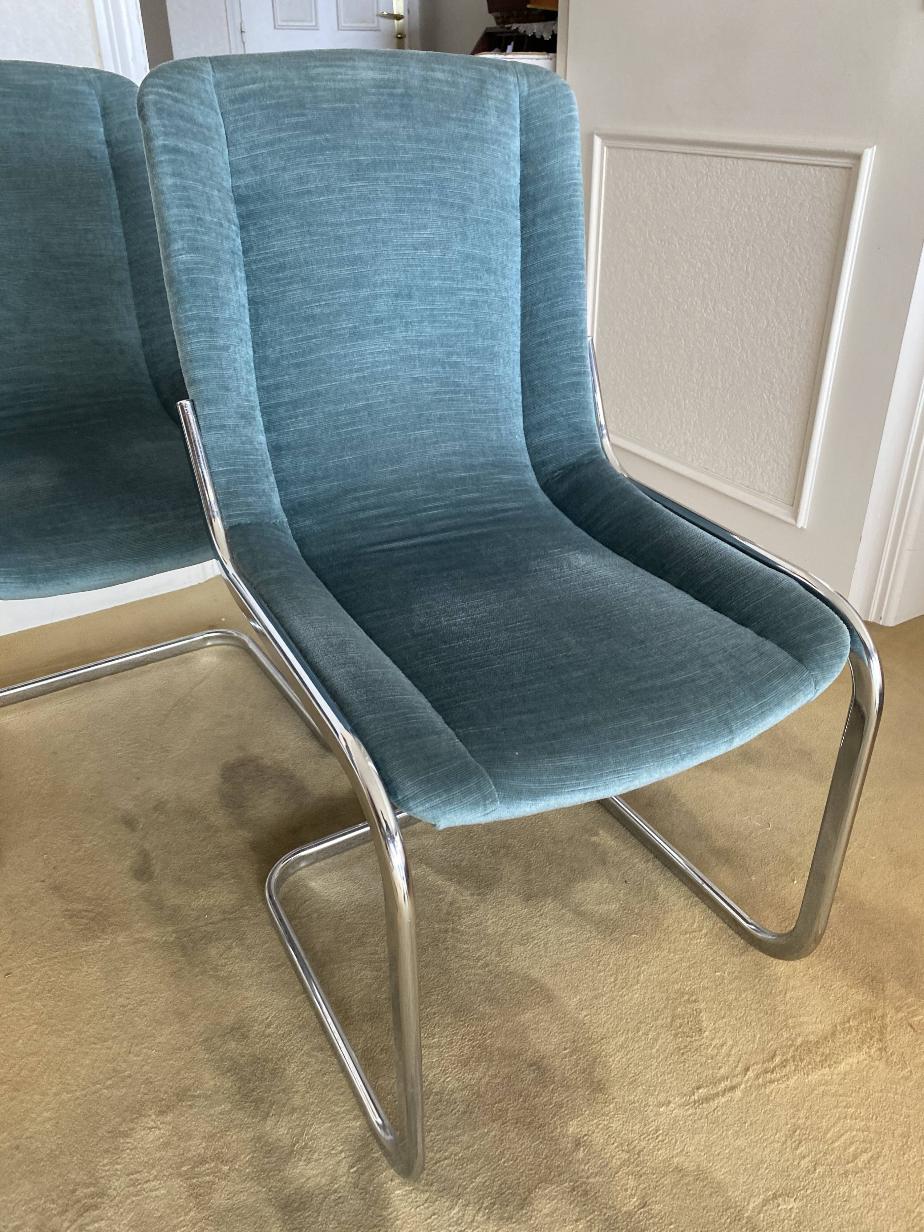 Set 4 steel design chairs and fabrics