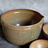 Three nesting pottery salad bowls in glazed stoneware