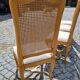 4 chaises en bois cérusé et dossier canné