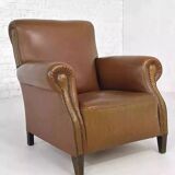 1950s club armchair in imitation leather and wood
