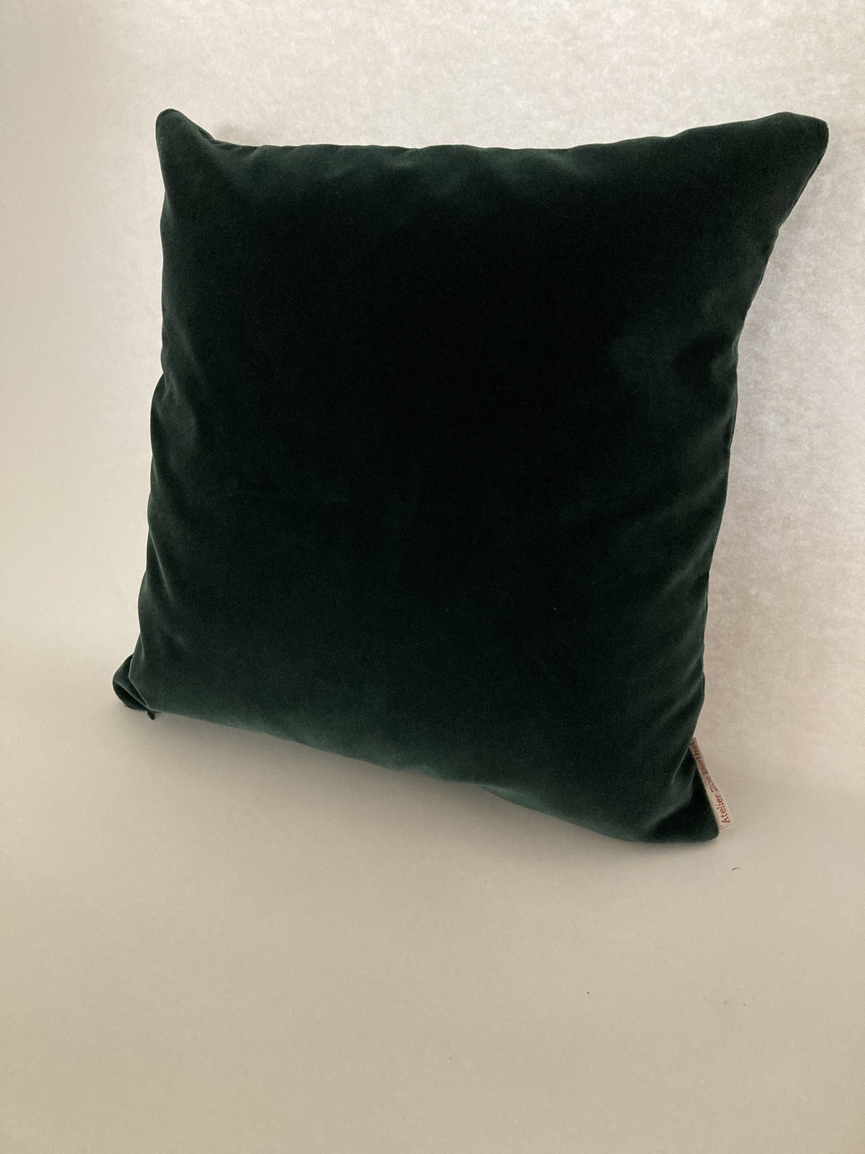 Forest green velvet cushion