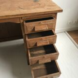Accountant in solid wood desk