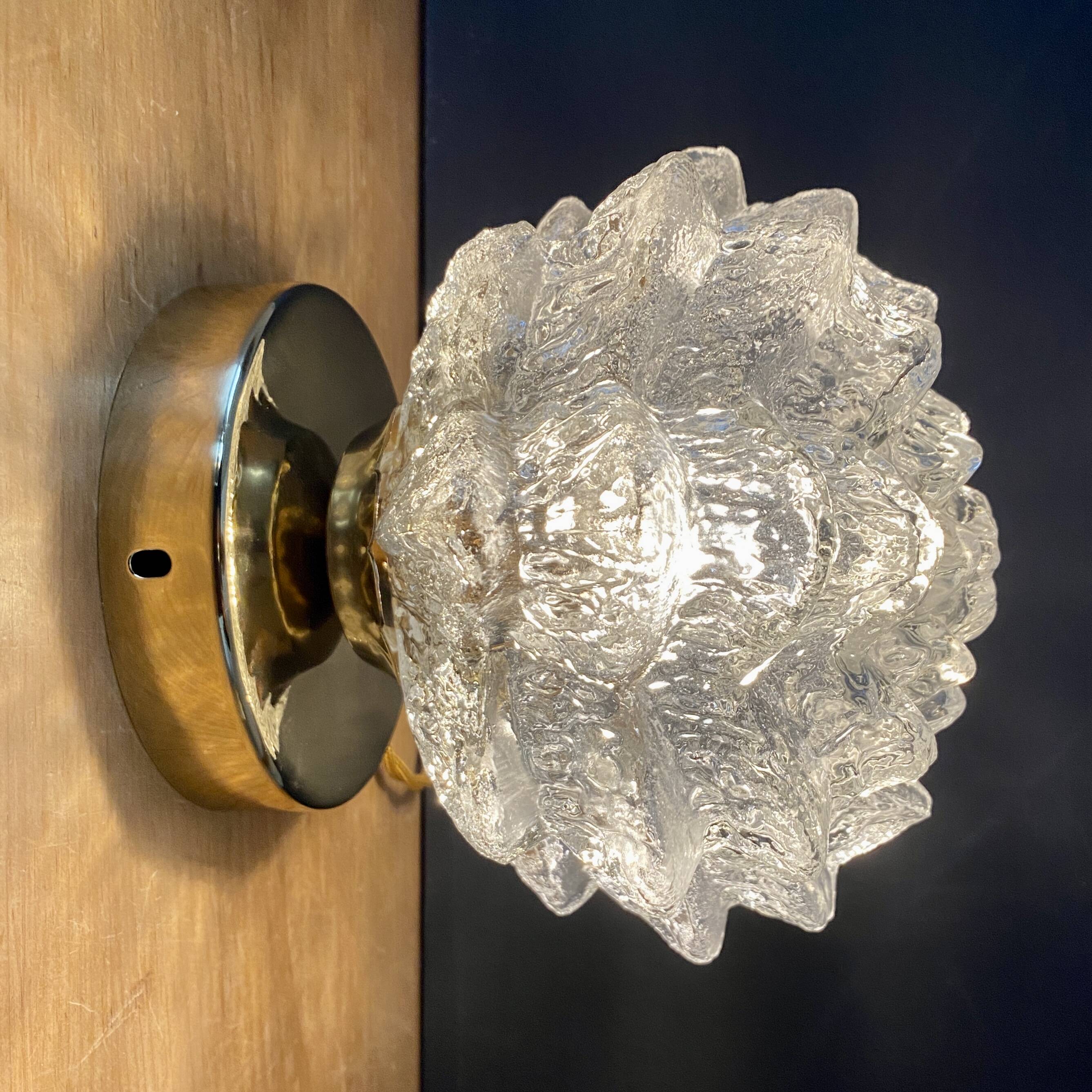 Vintage globe wall or ceiling light in molded glass in the shape of a flower