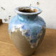 Enamelled sandstone vase