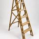 Vintage wooden painter's step ladder with a patina.