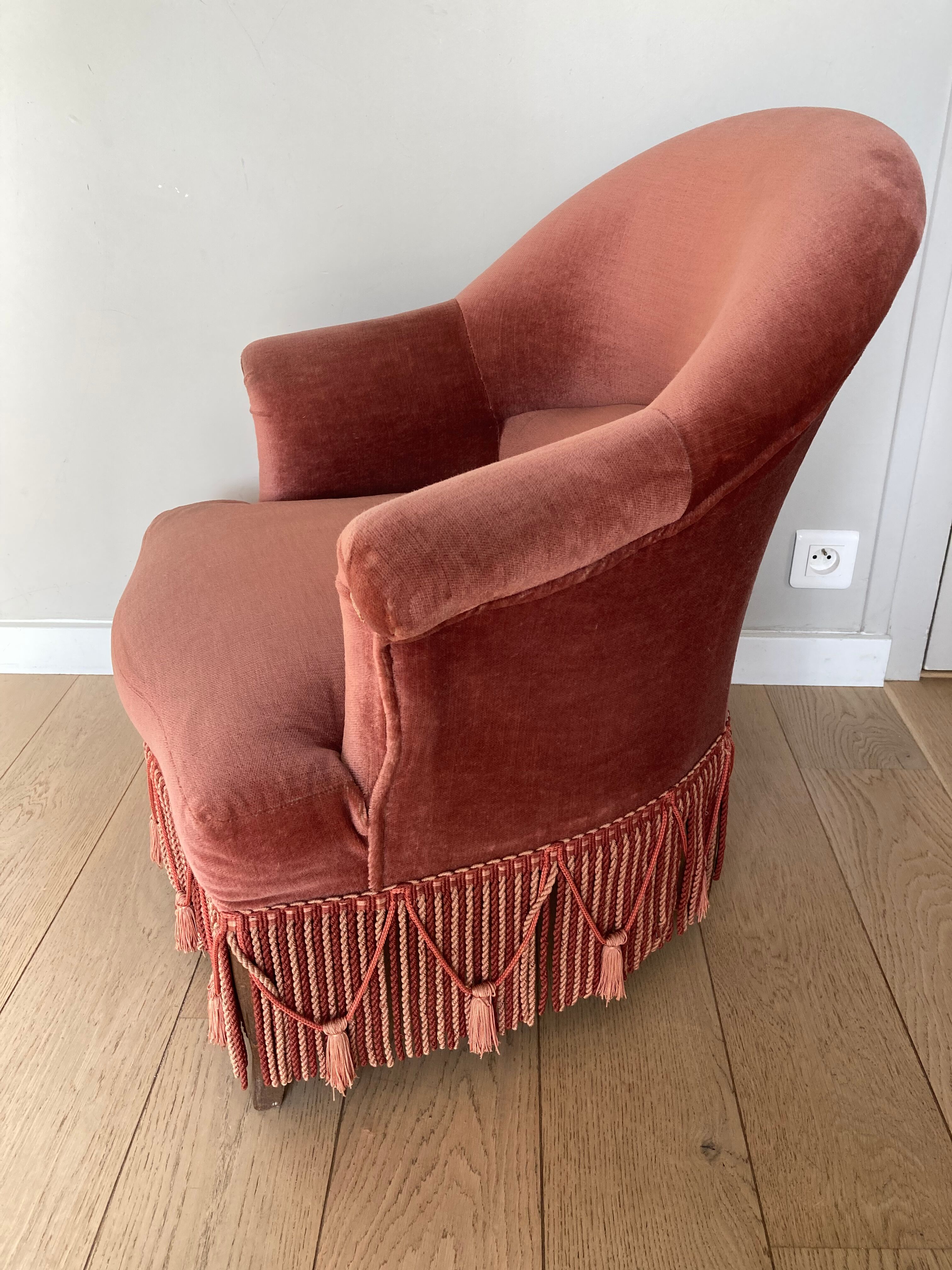 Pink velvet armchair