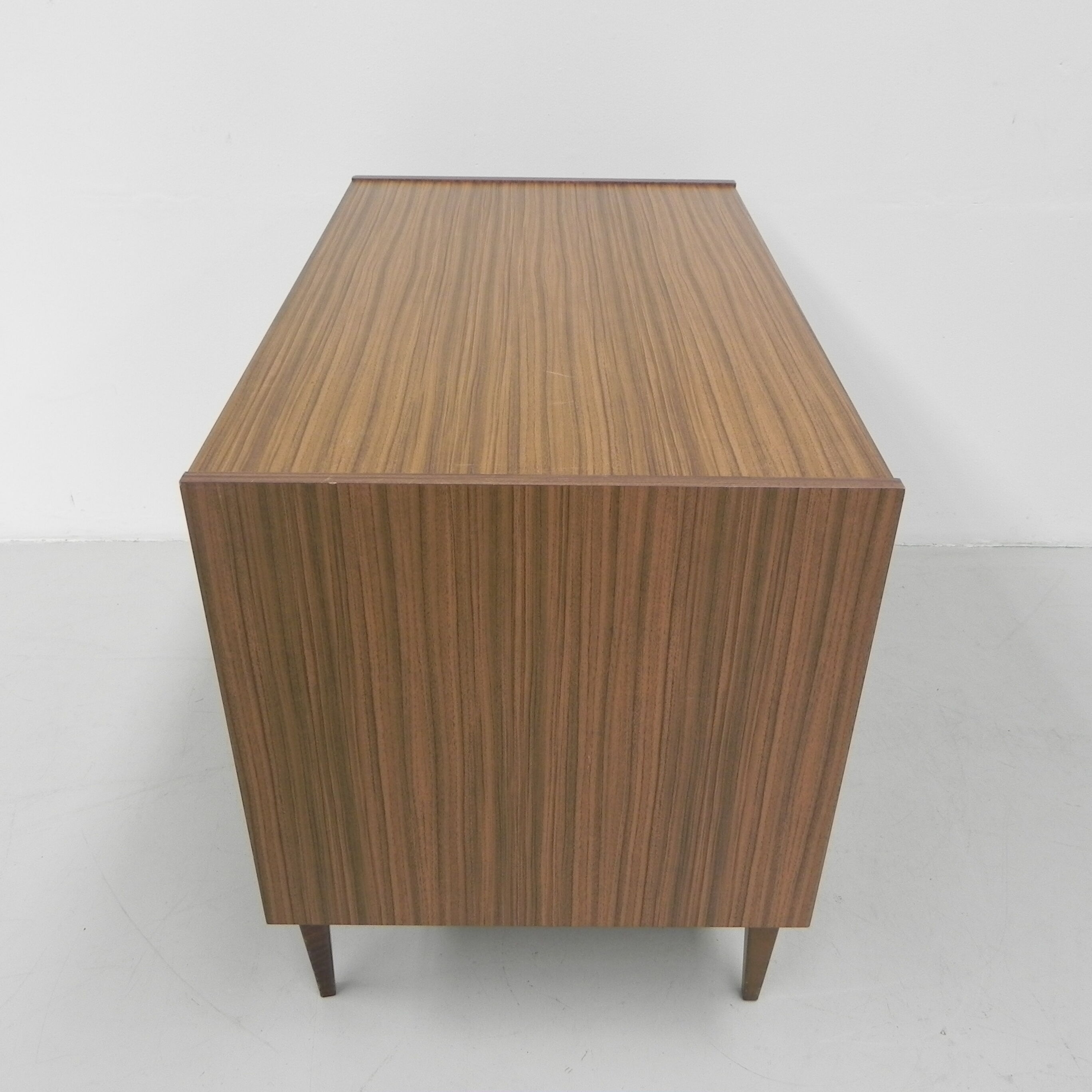 Vintage chest of drawers on tapered legs