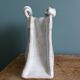 Vase en forme de sac, signé