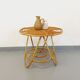 Round coffee table with 60's vintage rattan magazine tray