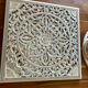 Magnificent carved frame with an interior mirror made of mango wood.