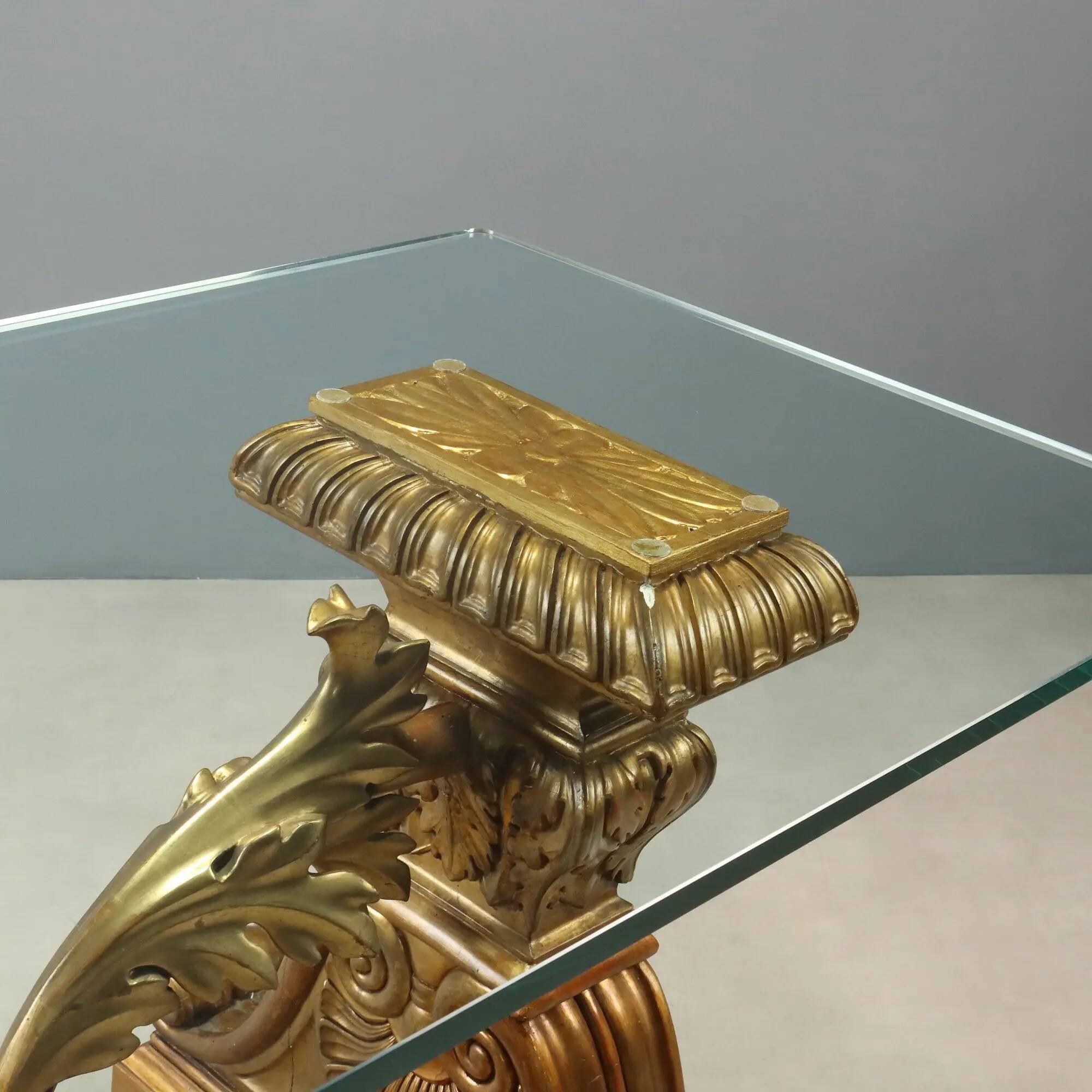 Antique coffee table in gilded wood with a glass top, Italy, 20th century.