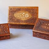 Antique hand-carved wooden boxes.
