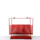Vintage magazine rack in red lacquered perforated metal from the 70s