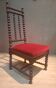 Chaise basse Napoléon III en velour rouge