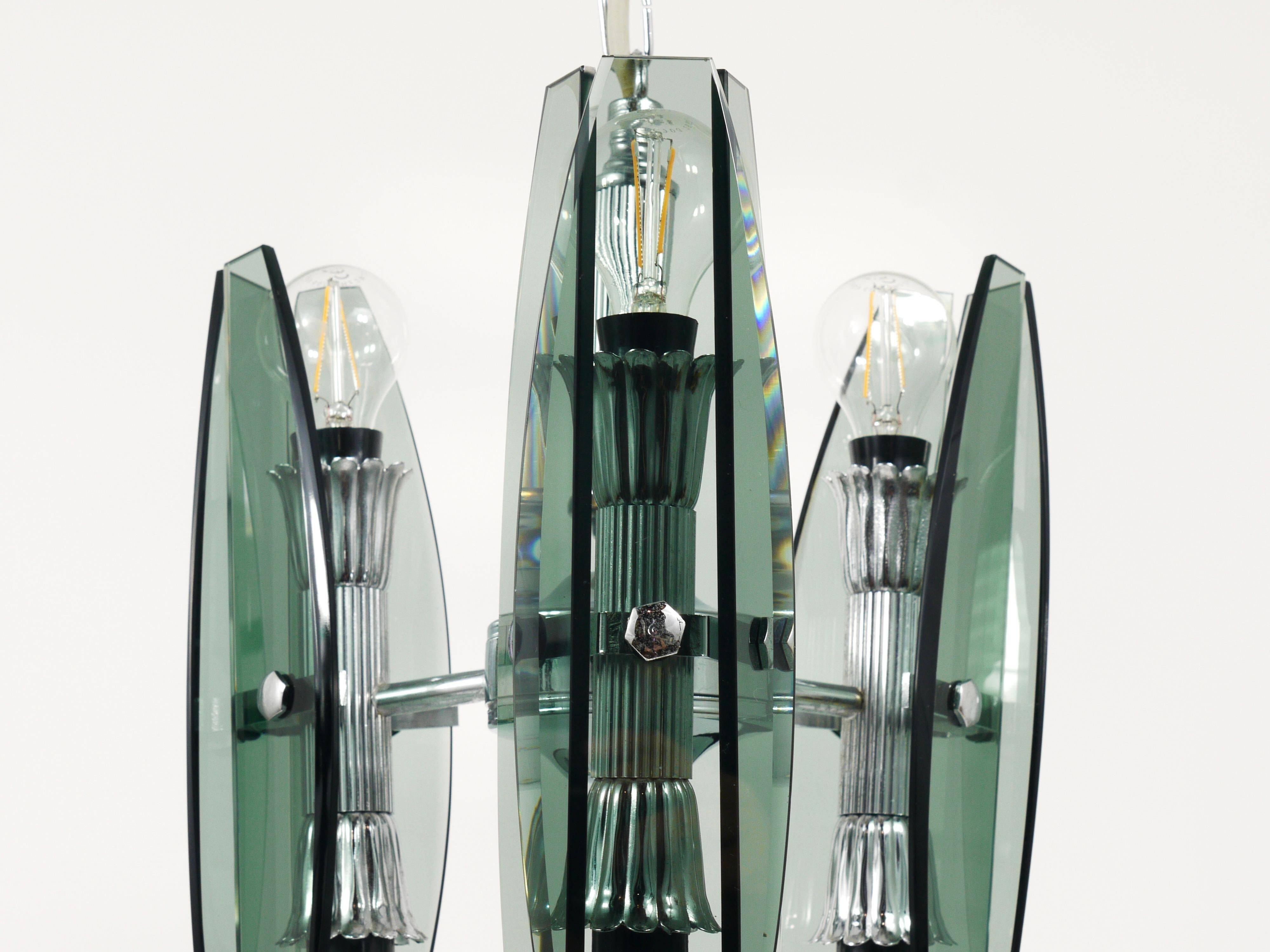 Glass and chrome suspension light in Fontana Arte style by Veca Murano, Italy.