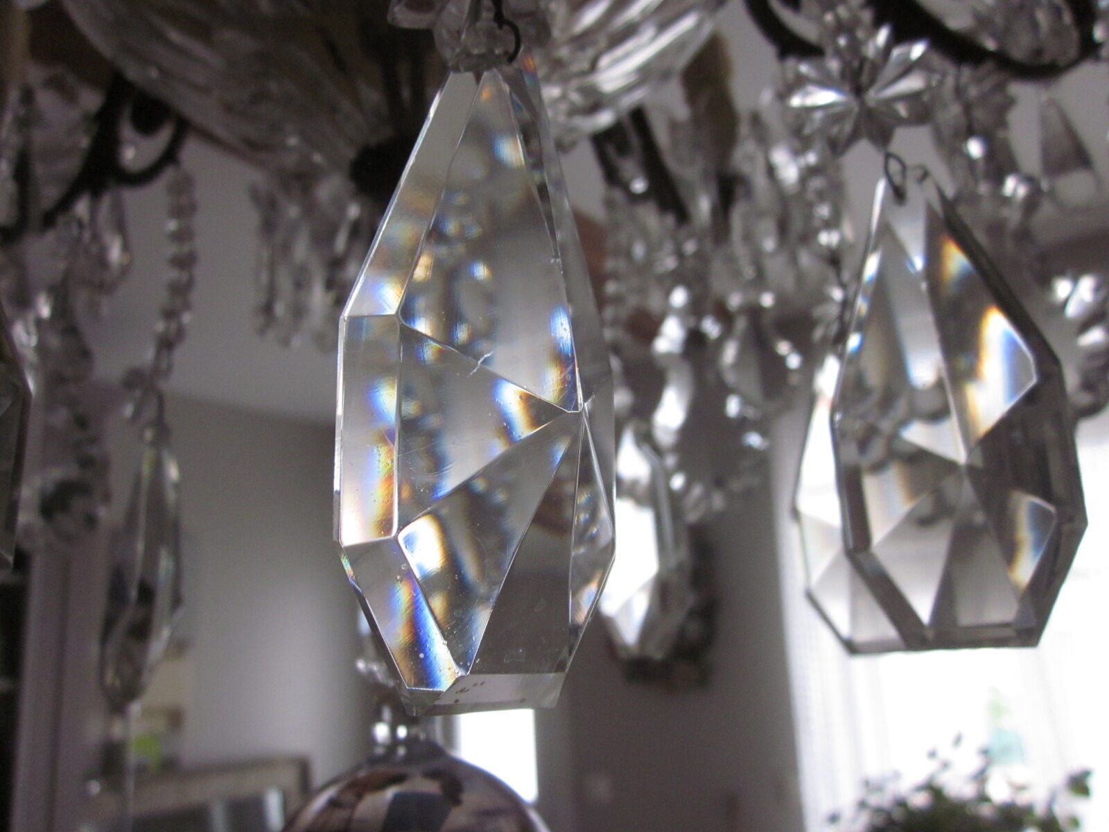 chandelier has antique pendants