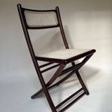 Set de quatre chaises pliantes en bois et cannage