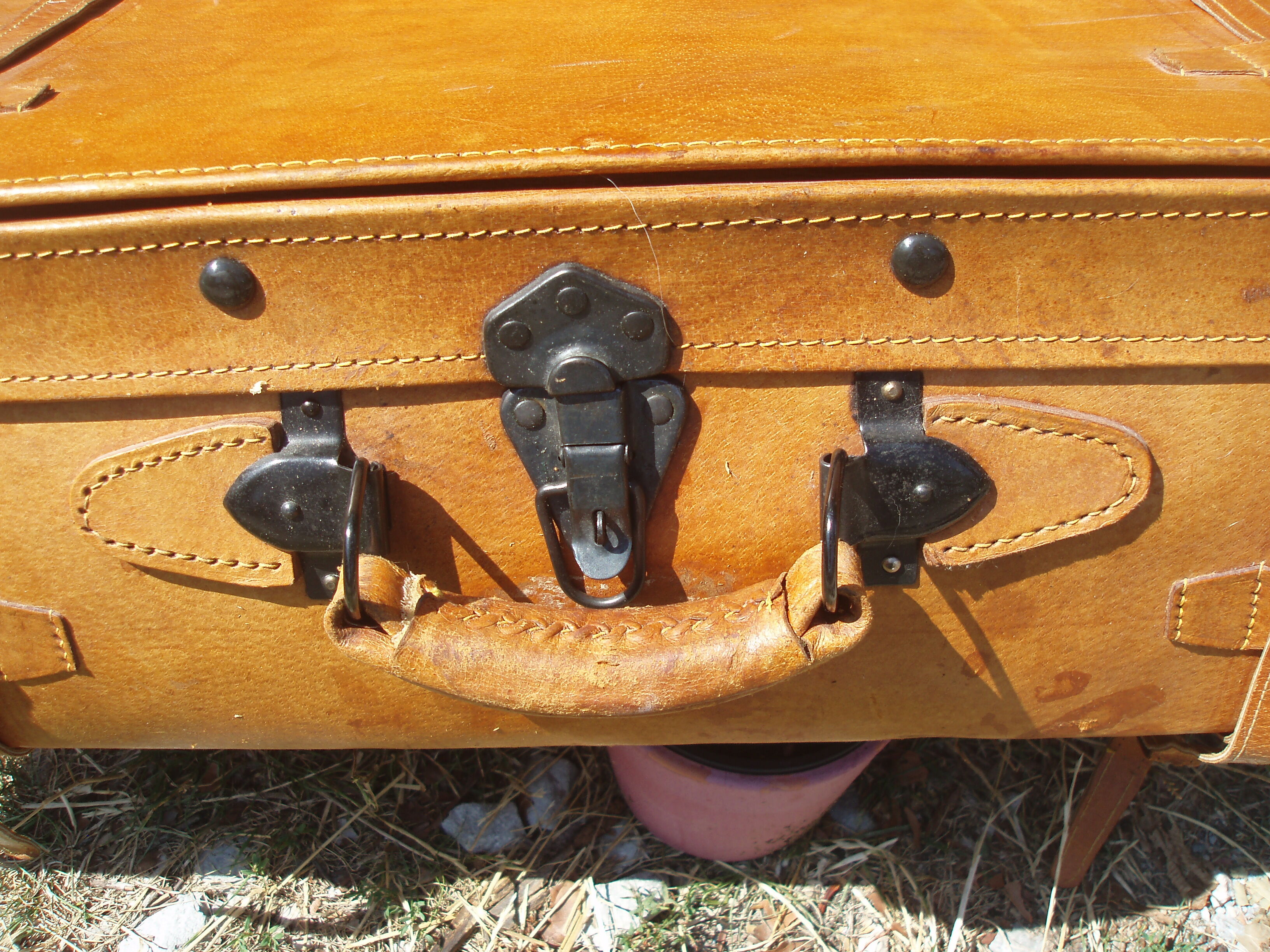 Old quality brown leather suitcase from the 60s