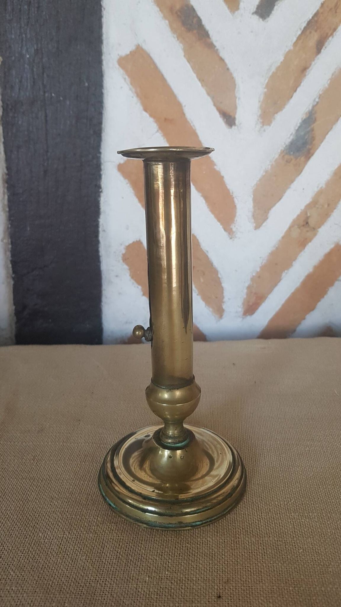 Brass candle holder with pusher and cup