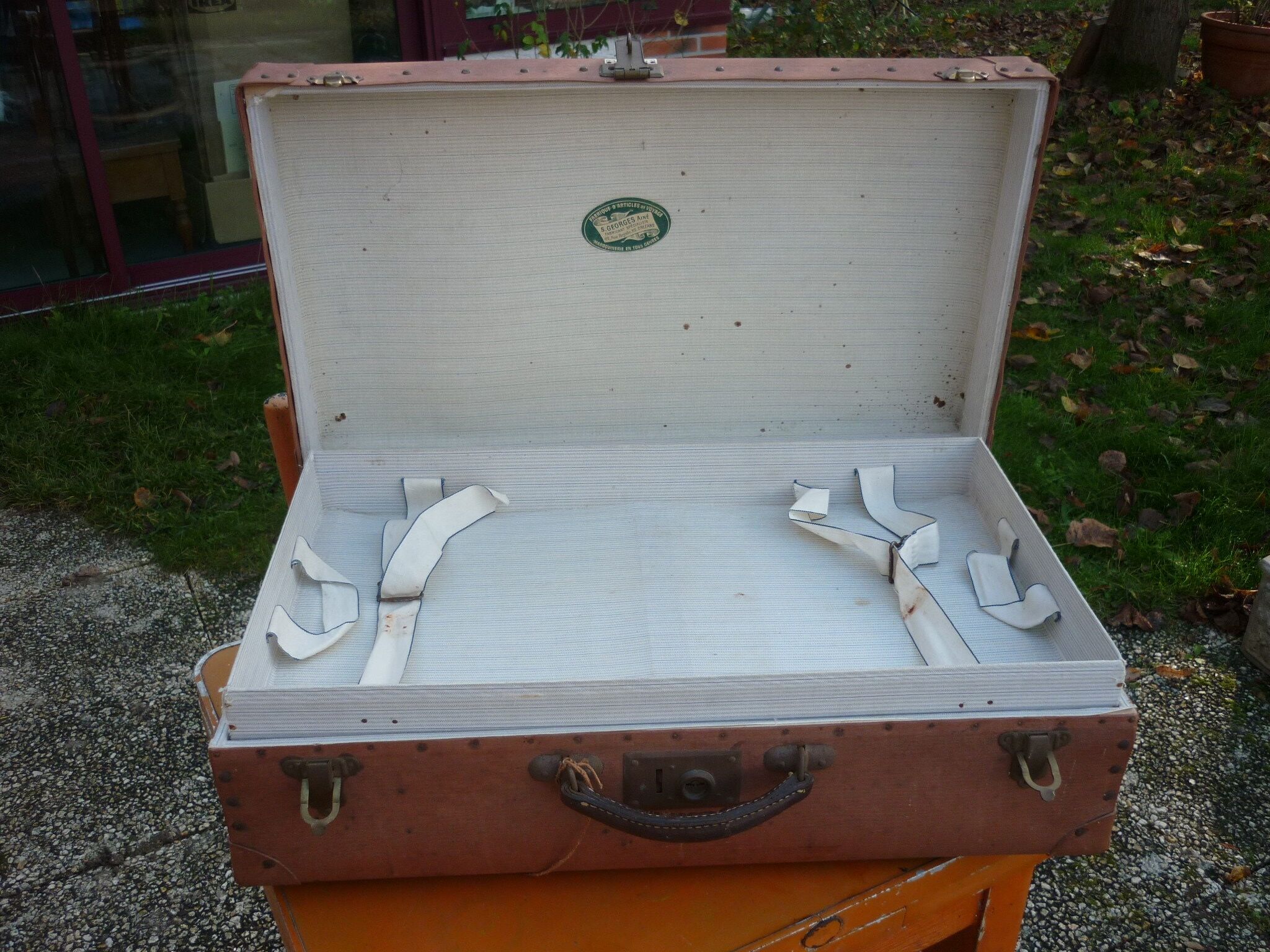 Green cardboard suitcase