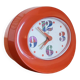 Vintage mechanical alarm clock in orange plastic Uti West Germany
