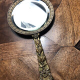 Hand mirror in gilded bronze
