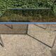 70s dining table in tubular chrome metal and smoked glass