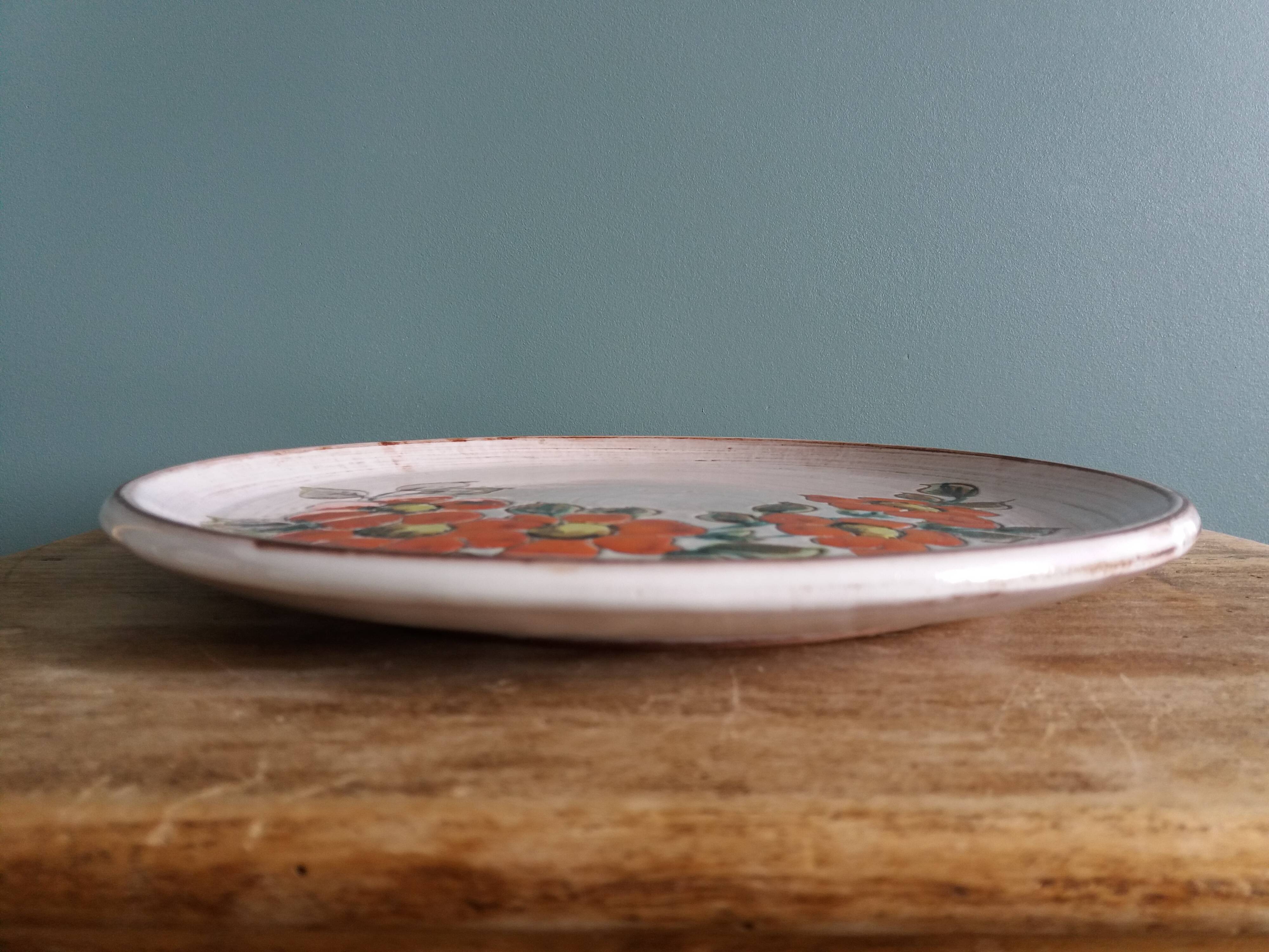 Vallauris handcrafted decorative wall plate with flower motif