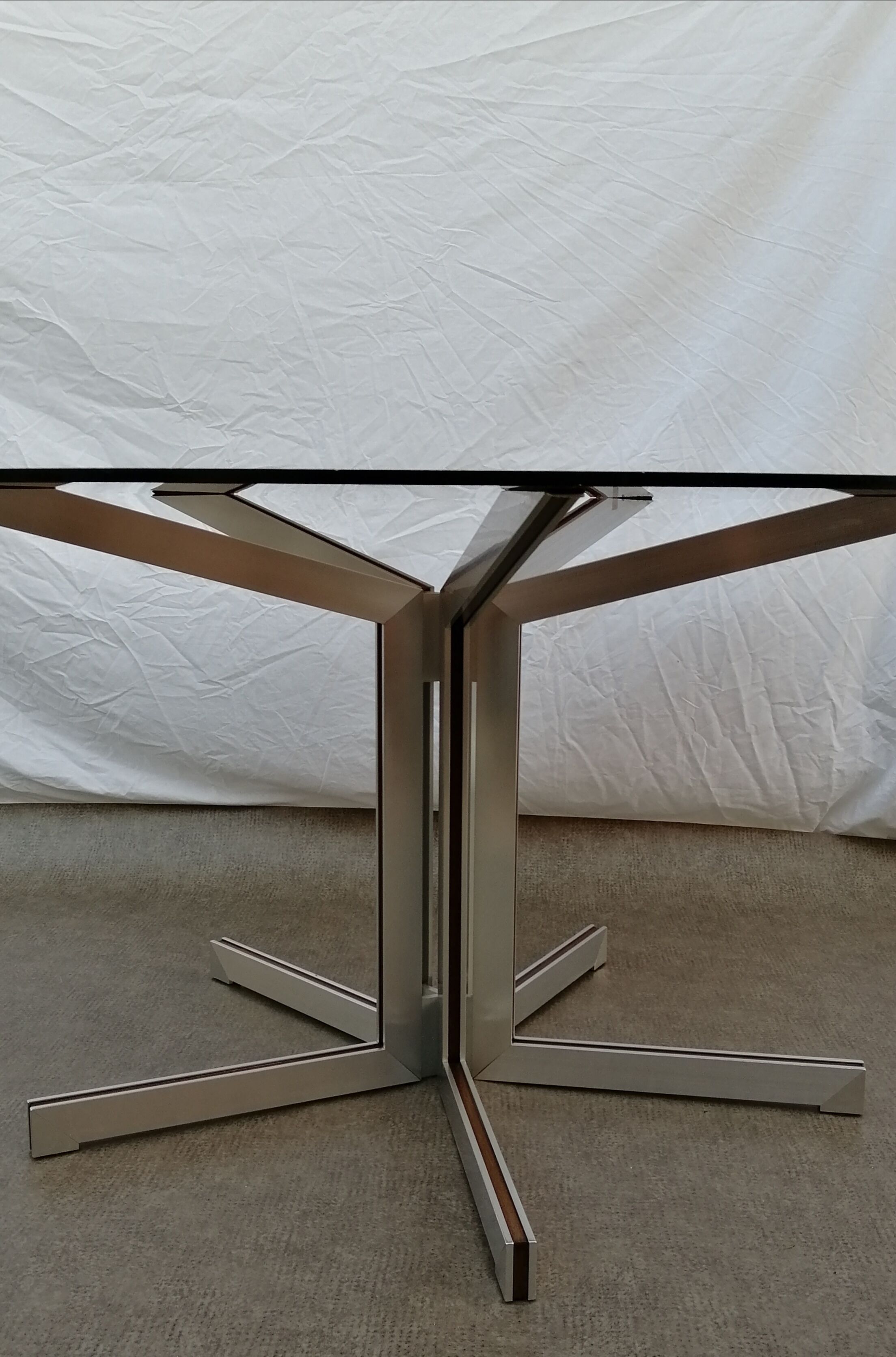 Round table, smoked glass in Rosewood and Aluminium by Claude Gaillard for Ligne Roset, 1970