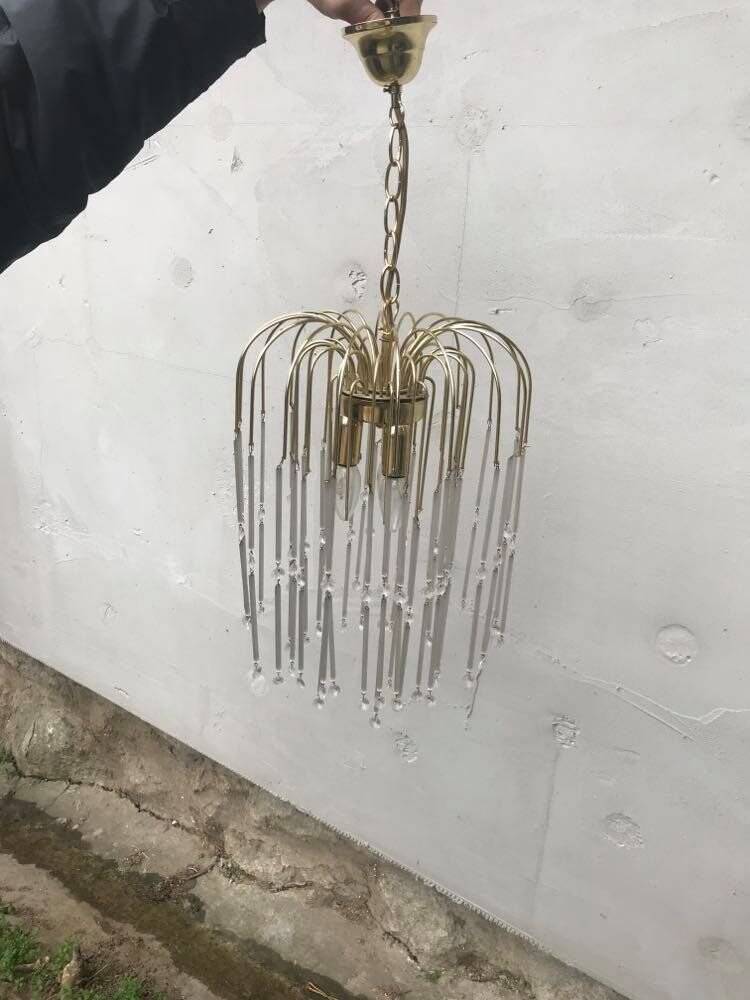 Vintage yellow chandelier in brass and Murano glass, 1970s, cascade style.