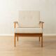 Elegant mid-century armchair from the 1960s with cream-white upholstery