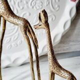 Stylized brass giraffes