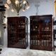 Pair of Empire period mahogany bookcases with flame pattern from the 19th century.