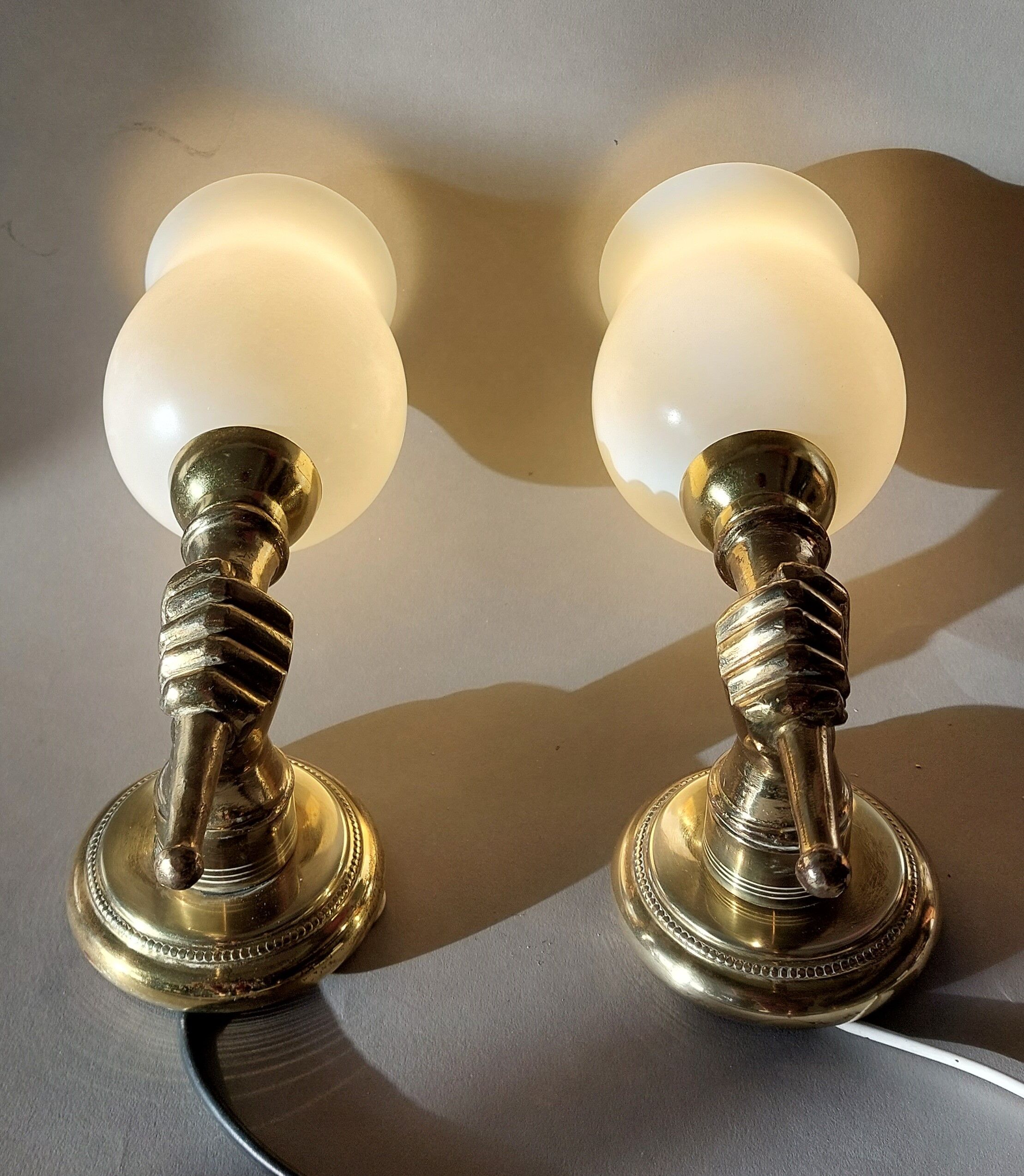 Pair of bronze and gilded brass sconces by John Devoluy 1950.