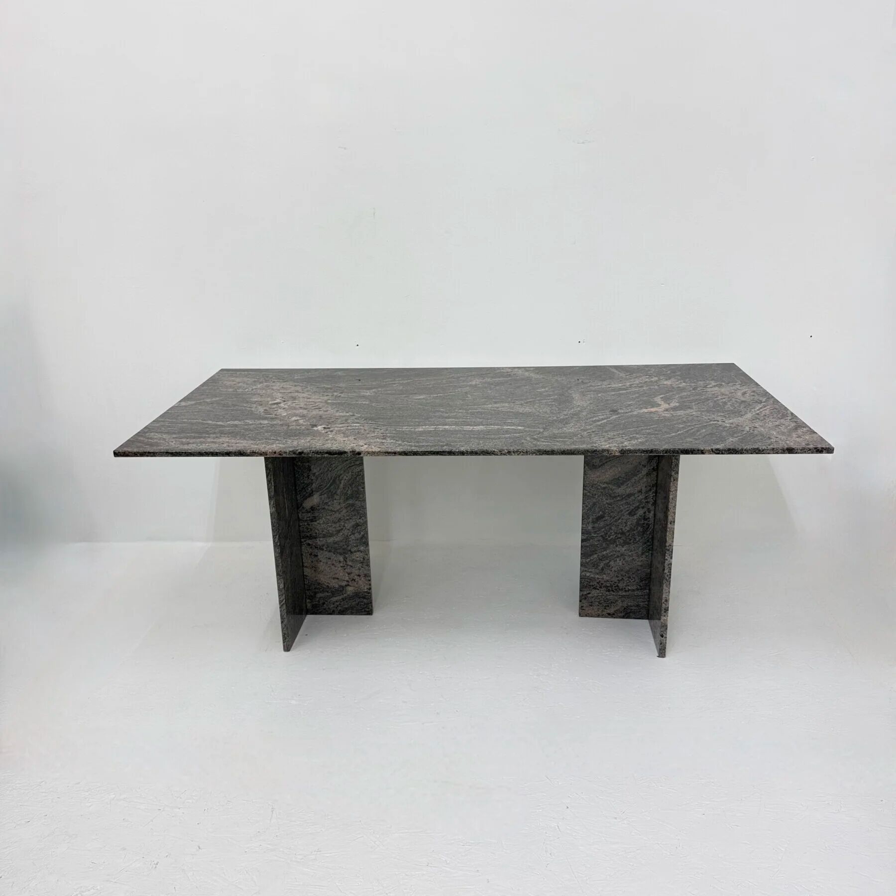 Mid-century design granite dining table, 1970shttps://nuvintage.nl/product/