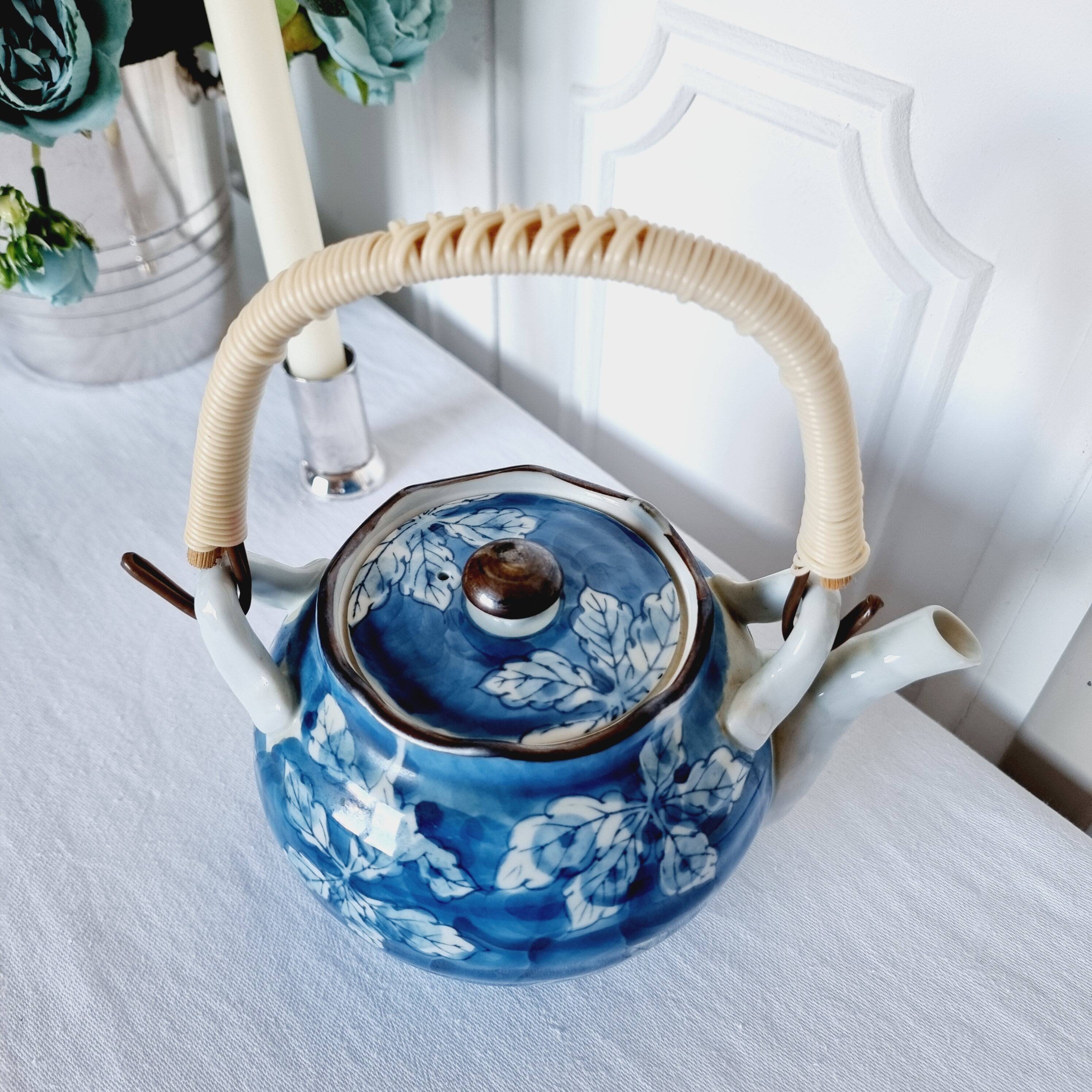 Handcrafted Japanese porcelain teapot hand painted in blue and white.