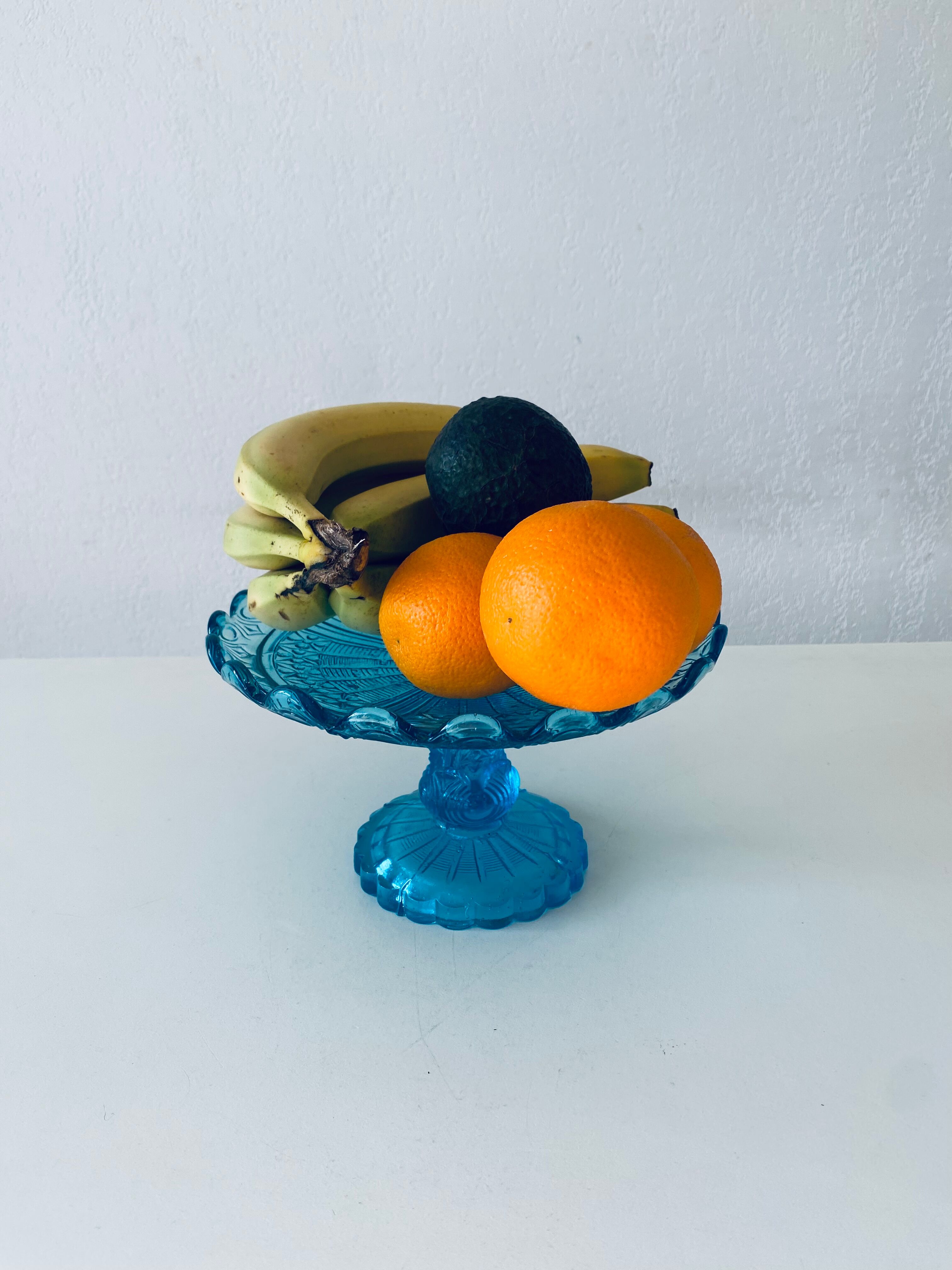 Blue glass stand cup