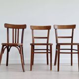 Mismatched wooden bistro chairs