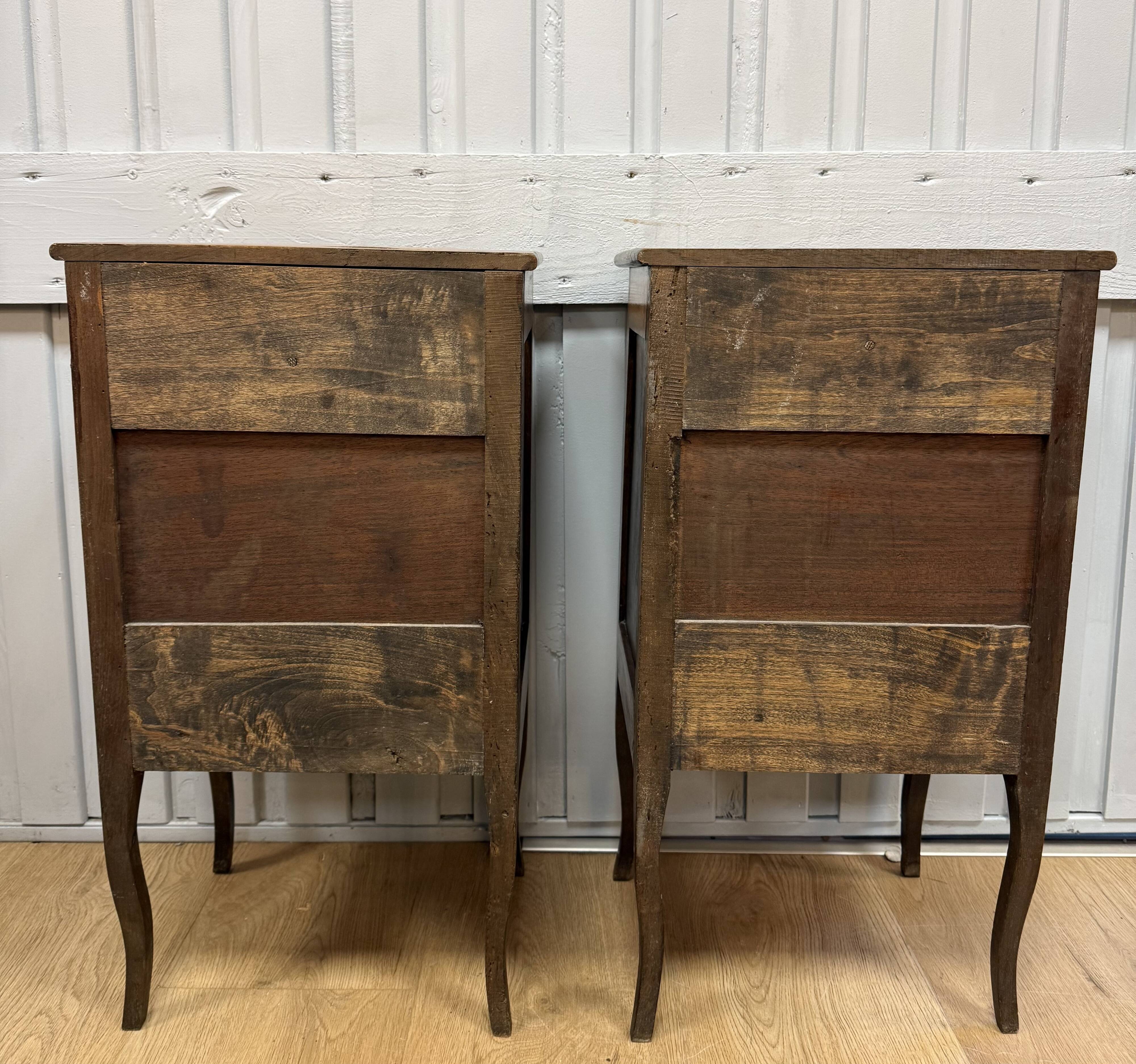 Pair of walnut bedside tables