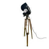 Floor lamp in the style of a cinema projector.