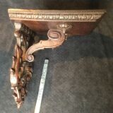 Oak applying console carved with rinsings