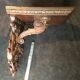 Oak applying console carved with rinsings