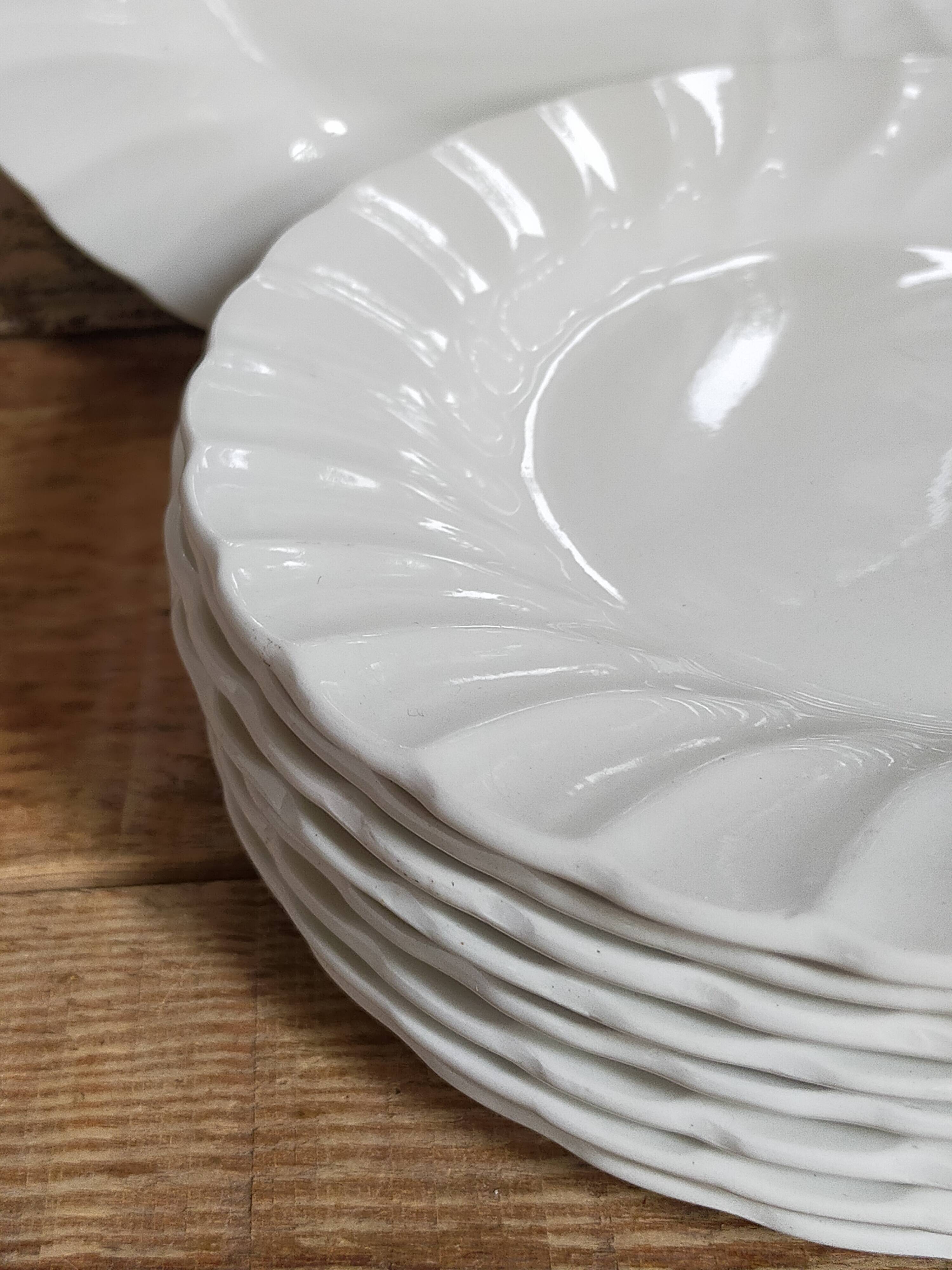 Nine fine English porcelain sweet plates