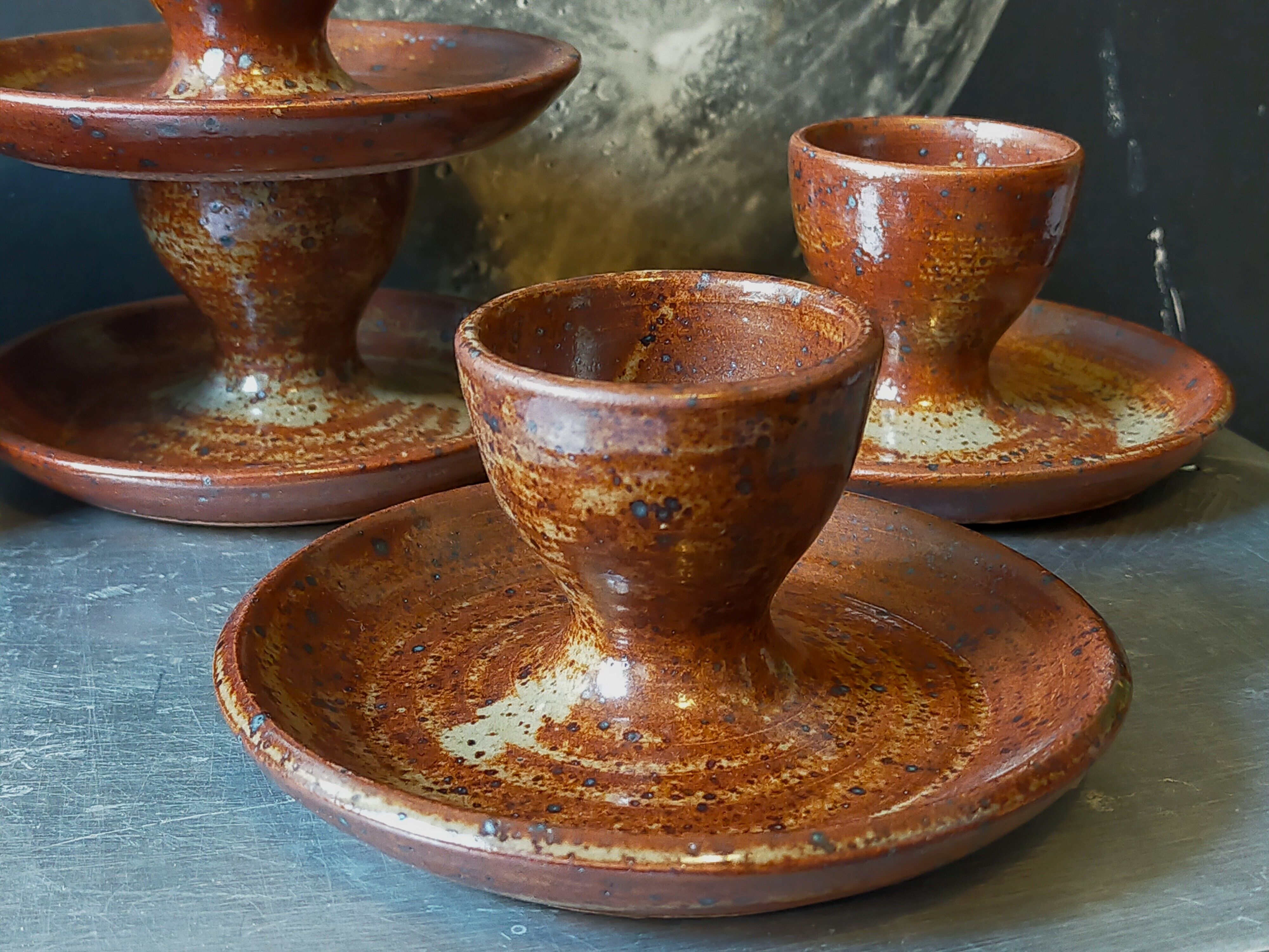 Four pyrite stoneware shells