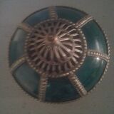 Ancient box in ceramic and enamel surrounded by brass