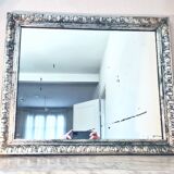 Old mercury mirror, in carved wood with silver leaf.