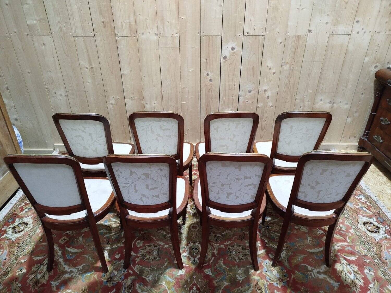 Suite de 8 chaises et paire de fauteuils Louis XVI
