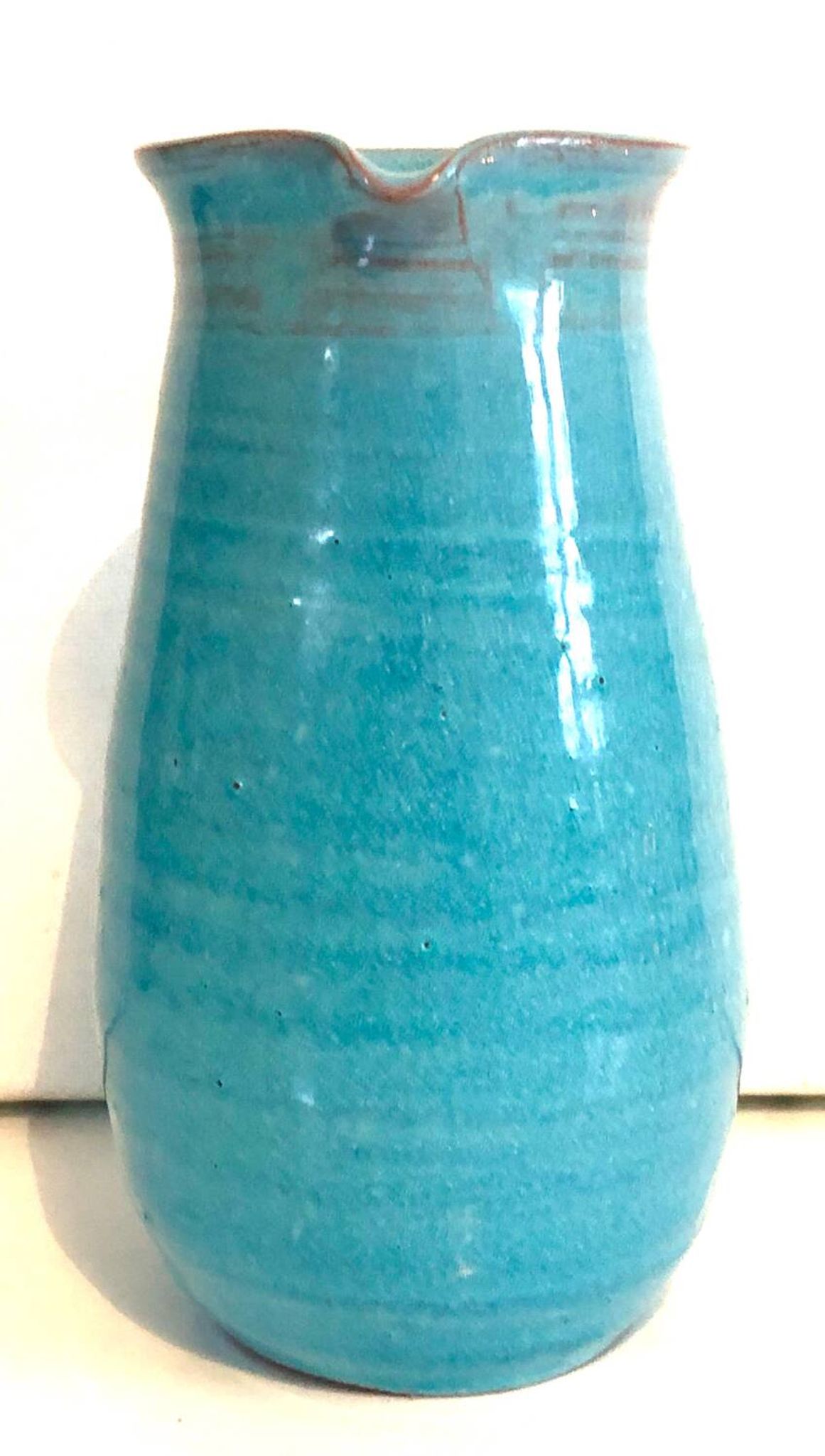 Blue ceramic pitcher